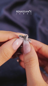 Platinum Emerald Cut Diamond Solitaire with Side Baguettes and Channel Set Band