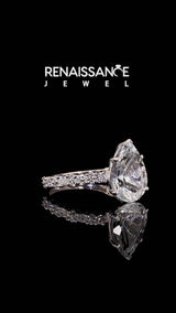 Silver Pear Cut Aquamarine Side Stone Solitaire Ring with Round  and Four-Prong Setting