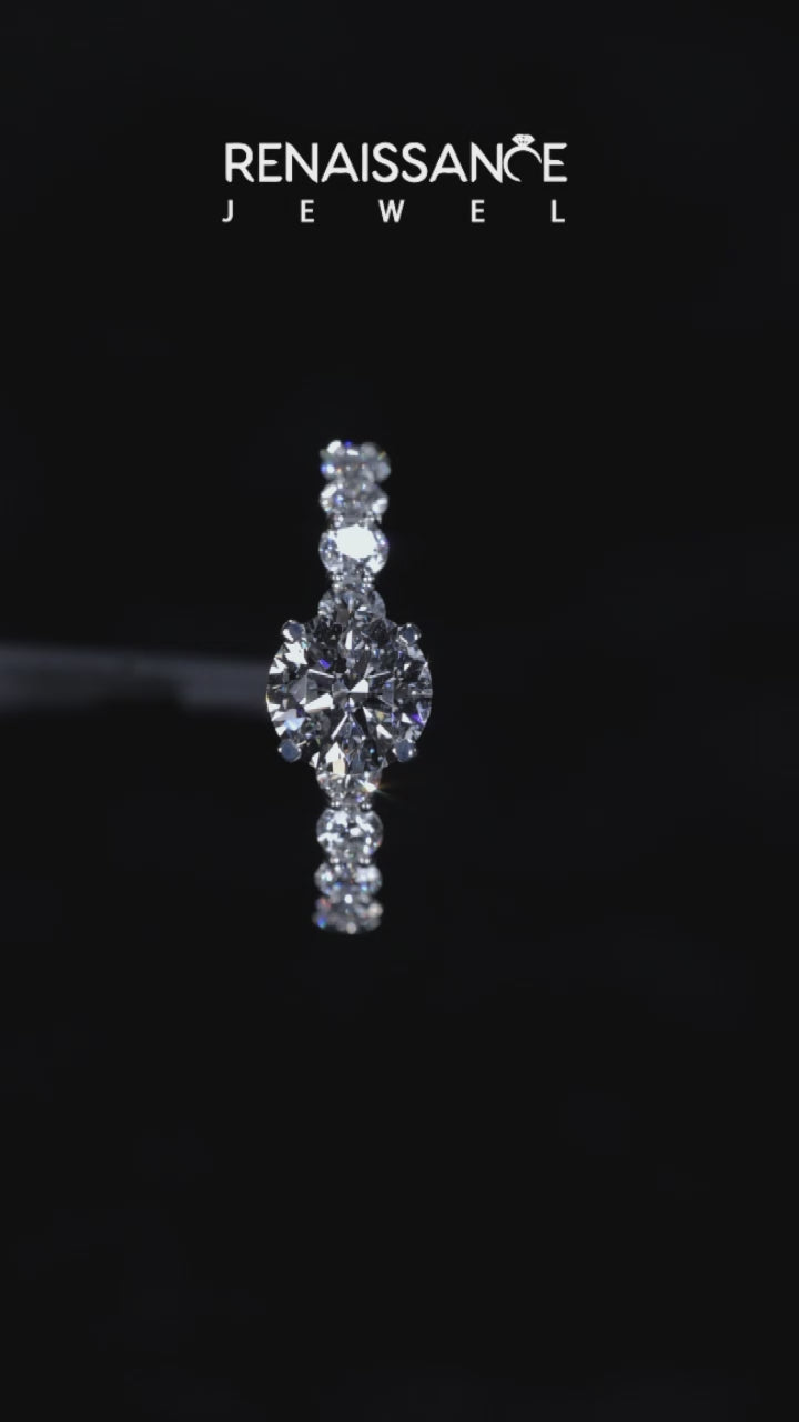 Platinum Round Diamond Prong Setting with Side Stones on a Pave Band 3