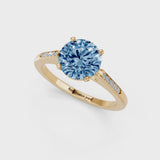 Yellow gold Fancy Blue Round  Cut Channel Set Solitaire Engagement Ring with Four-Prong Setting