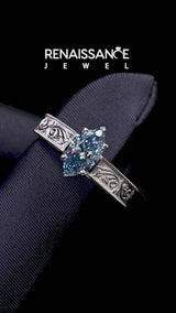 Silver Fancy Blue Marquise Cut Diamond Solitaire Ring with Engraved Band and Four-Prong Setting