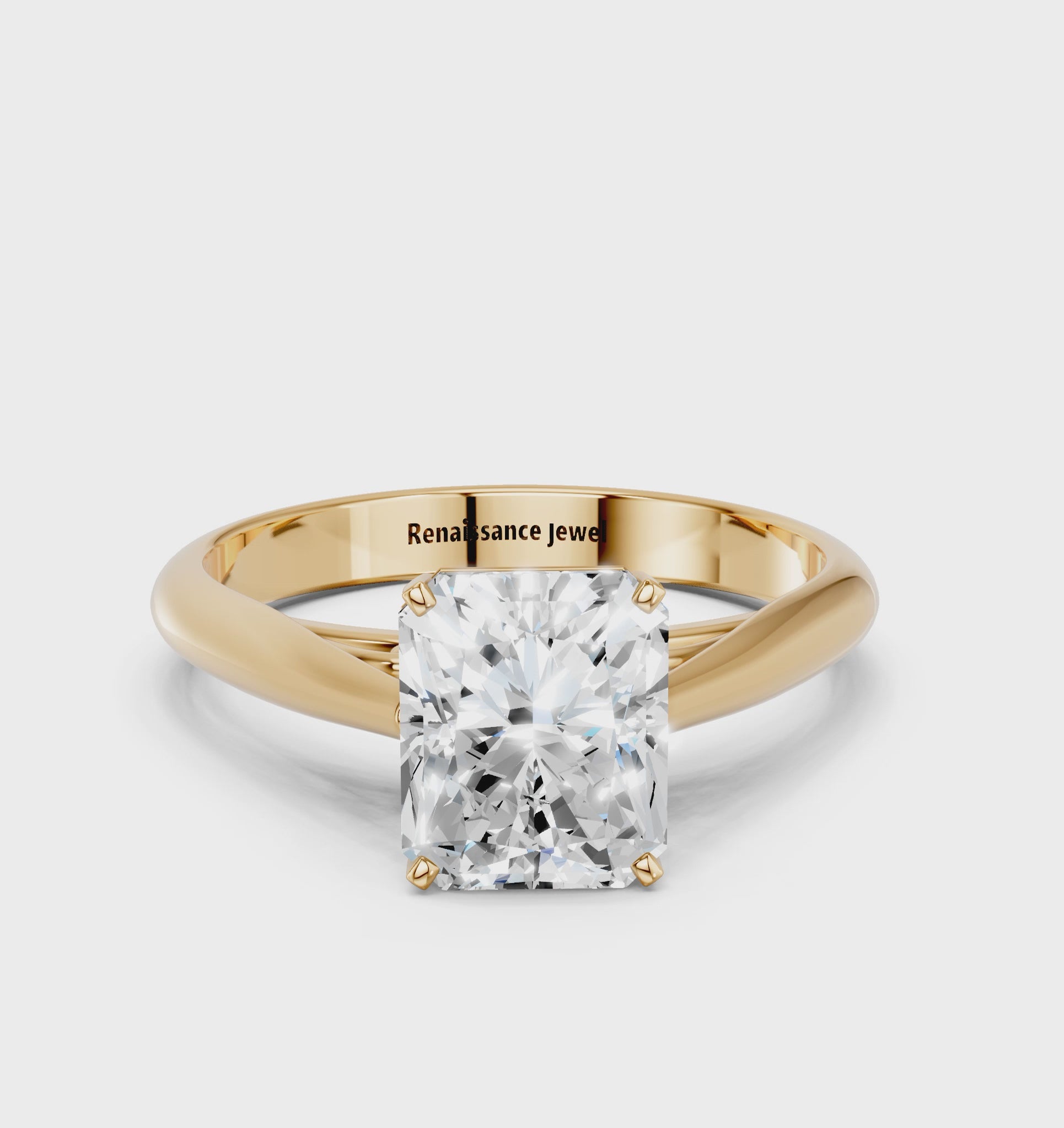 Yellow gold Radiant Solitaire Diamond Engagement Ring with Cathedral Setting and Four-Prong Mount on a Classic Band_45