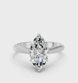 White gold Marquise Cut Diamond Solitaire Engagement Ring with Cathedral Setting and Four-Prong Mount