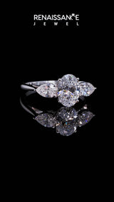Silver Round Cut Diamond Three-Stone Ring with Pear  Side Stones and Prong Setting