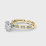 Yellow gold Oval Solitaire Diamond Ring with Channel-Set Baguette Band and Four-Prong Setting
