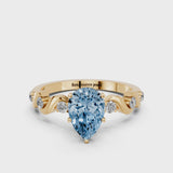 Yellow gold Fancy Blue Pear  Solitaire Twisted Band with Prong Setting