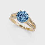 Yellow gold Fancy Blue Round Cut Diamond Solitaire Engagement Ring with Split Shank Pavé Band