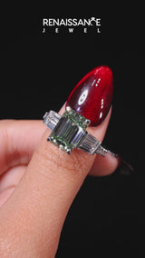 Platinum Fancy Green Emerald Cut Diamond Engagement Ring with Baguette Side Stones and Channel Set Band