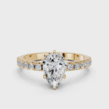 Yellow gold Pear Cut Diamond Solitaire Pavé Band with Four-Prong Setting