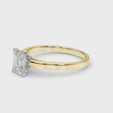 Yellow gold Radiant Solitaire Diamond Engagement Ring with Four-Prong Setting on a Classic Band