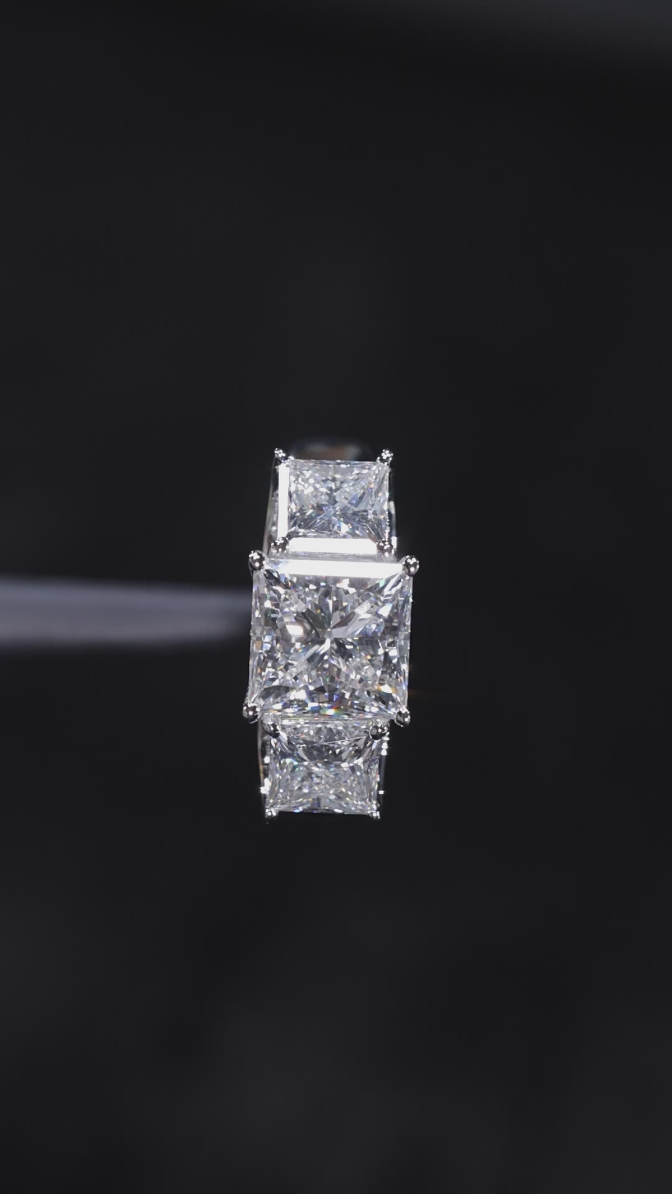 Silver Three-Stone Princess Cut Diamond Ring with Channel-Set Band and Four-Prong Setting 3