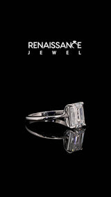 Silver Emerald Cut Moissanite Solitaire Engagement Ring with Round Band and Four-Prong Setting