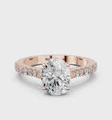 Rose gold Oval Cut Solitaire Diamond Engagement Ring with Pave Band and Four-Prong Setting