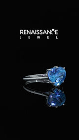 Silver Heart Cut Blue Topaz Solitaire Ring with Flower Prong Setting and Classic Band