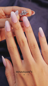 Rose gold Cushion Solitaire with Tapered Baguette Side Stones on a Classic Band with Four-Prong Setting