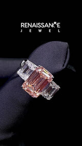 Platinum Three-Stone Fancy Pink Emerald Cut Diamond Engagement Ring with Prong Setting