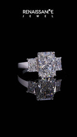 Silver Three-Stone Radiant Cut Diamond Ring with Prong Setting and Classic Band