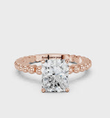 Rose gold Radiant Cut Diamond Solitaire Ring with Beaded Band and Prong Setting