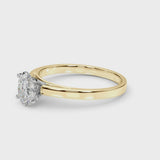 Yellow gold Oval Solitaire Diamond Engagement Ring with Four-Prong Setting on a Classic Band