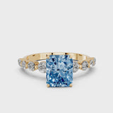 Yellow gold Fancy Blue Radiant Cut Solitaire Diamond Ring with Pave Band and Four-Prong Setting