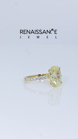 Yellow gold Fancy Yellow Oval Cut Diamond Solitaire Ring with Round  Pavé Band and Prong Setting