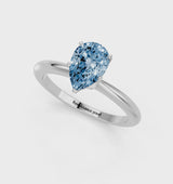 White gold Fancy Blue Pear Cut Diamond Solitaire Ring with Six-Prong Setting and Classic Band