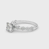 White gold Round Cut Diamond Side Stone Solitaire Ring with Round  and Four-Prong Setting