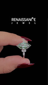 White gold Fancy Green Marquise Cut Diamond Ring with Marquise and Round Side Stones on a Plain Band