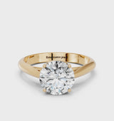 Yellow gold Round Cut Diamond Solitaire Engagement Ring with Cathedral Setting and Four-Prong Mount