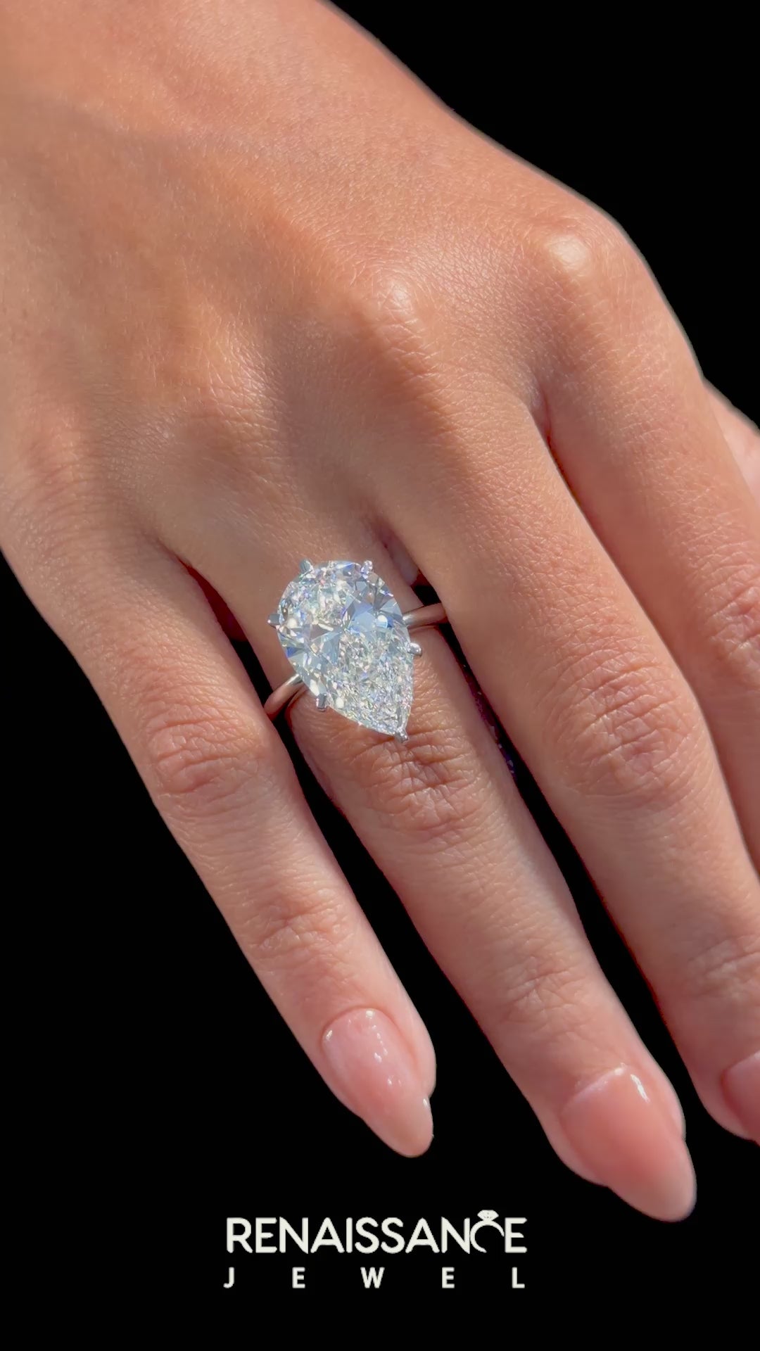 Silver Pear Solitaire Engagement Ring with Classic Band and Four-Prong Setting_40