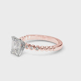 Rose gold Emerald Solitaire Bezel Accent Diamond Engagement Ring with Beaded Band and Four-Prong Setting