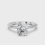 Platinum Oval Cut Diamond Solitaire Ring with Six-Prong Setting and Classic Band