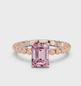 Rose gold Fancy Pink Emerald Cut Diamond Solitaire Ring with Beaded Band and Prong Setting
