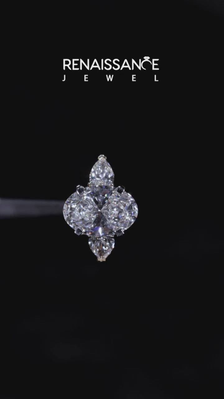 Yellow gold Three-Stone Oval Diamond Ring with Pear Side Stones on a Platinum Band with Four-Prong Setting 6