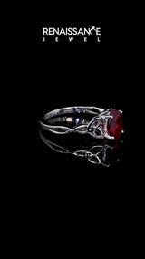 White gold Oval Cut Ruby Solitaire Celtic Knot Ring with Four-Prong Setting