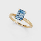 Yellow gold Fancy Blue Emerald Cut Diamond Solitaire Ring with Six-Prong Setting and Classic Band