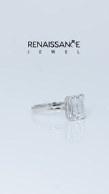 Silver Emerald Cut Moissanite Solitaire Engagement Ring with Round Band and Four-Prong Setting