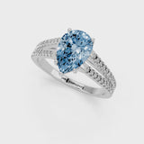 White gold Fancy Blue Pear Cut Diamond Solitaire Engagement Ring with Split Shank Pavé Band