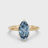 Yellow gold Fancy Blue Marquise Cut Diamond Solitaire Ring with Six-Prong Setting and Classic Band