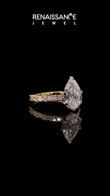 Yellow gold Pear Cut Diamond Side Stone Solitaire Ring with Round  and Four-Prong Setting