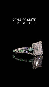 Platinum Radiant Cut Diamond Ring with Marquise and Round with Green Sapphire side stone Side Stones and Four-Prong Setting