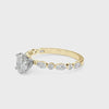 Yellow gold Oval Solitaire with Side Stones on a Pavé Band and Four-Prong Setting 4