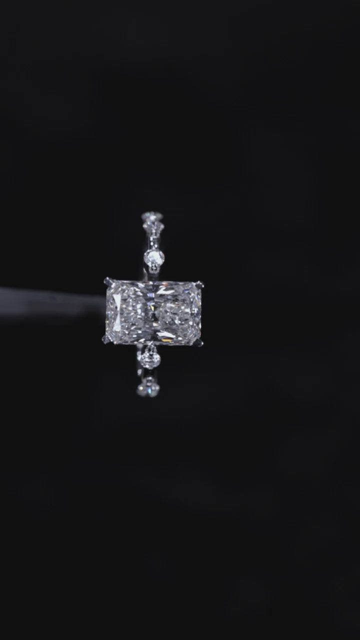 White gold Radiant Solitaire Diamond Ring with Bezel Set Side Stones and Prong Setting 4