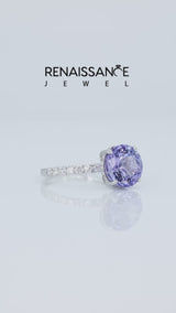 Silver Round Cut Tanzanite Solitaire Ring with Round  Pavé Band and Four-Prong Setting