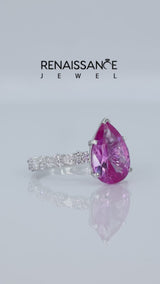 Silver Pear Cut Pink Sapphire Side Stone Solitaire Ring with Round and Four-Prong Setting