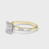 Yellow gold Emerald Cut Diamond Solitaire with Side Baguettes and Channel Set Band