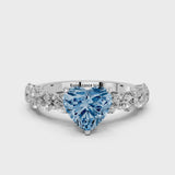 Silver Fancy Blue Heart Cut Diamond Prong Setting with Side Stones on a Pave Band