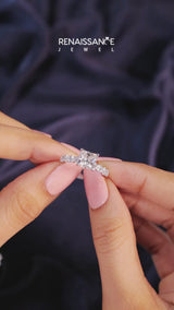 White gold Princess Cut Diamond Prong Setting with Side Stones on a Pave Band