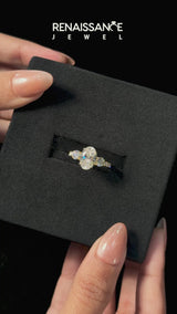 Yellow gold Oval Cut Diamond Three-Stone Ring with Round Side Stones and Pavé Band