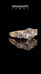Yellow gold Radiant Cut Diamond Three-Stone Ring with Channel Set Band and Four-Prong Setting